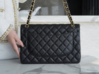 FLAP BAG JUMBO 30CM GOLD HARDWARE BLACK CAVIAR
