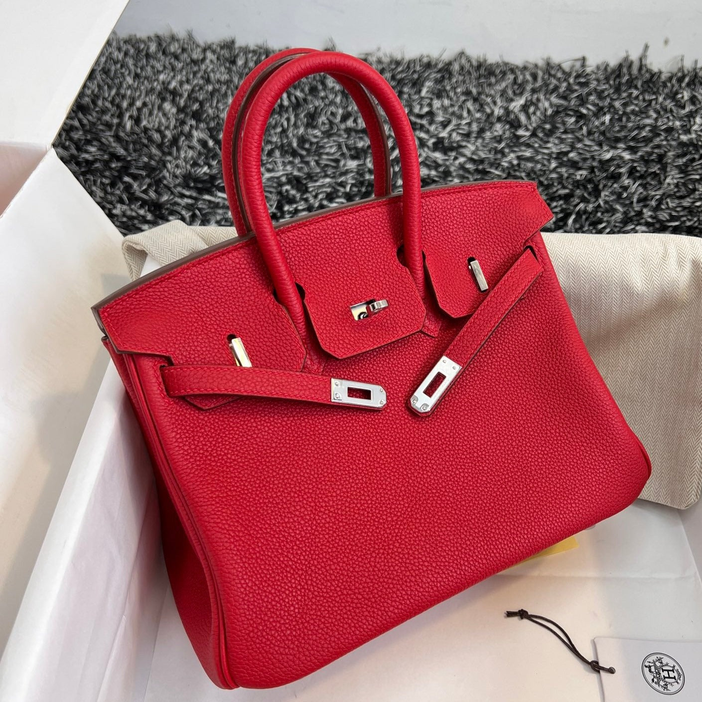 HM Birkin 25 cm, rotes Togo-Leder, silberne Beschläge
