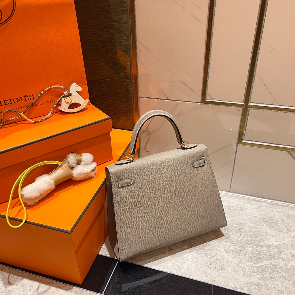 HM KELLY 25CM GRAUES EPSOM-LEDER GOLDENE BESCHLÄGE