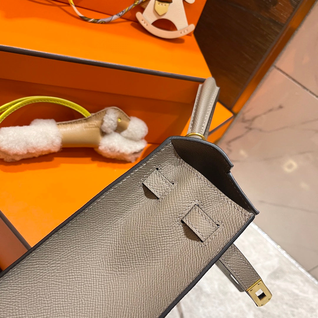 HM KELLY 25CM GRAUES EPSOM-LEDER GOLDENE BESCHLÄGE