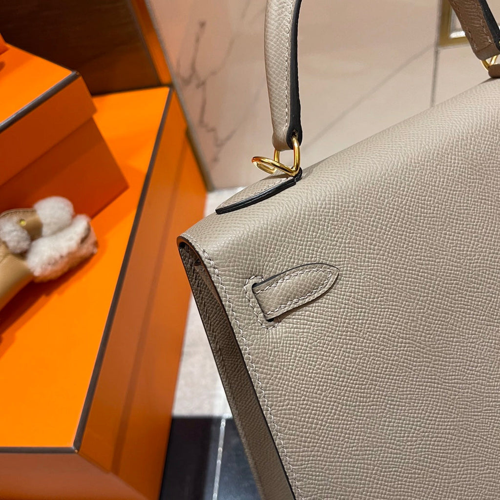 HM KELLY 25CM GRAUES EPSOM-LEDER GOLDENE BESCHLÄGE