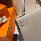 HM KELLY 25CM GRAUES EPSOM-LEDER GOLDENE BESCHLÄGE