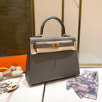 HM KELLY 25CM GRIS MOUETTE EPSOM LEDER GOLDENE BESCHLÄGE