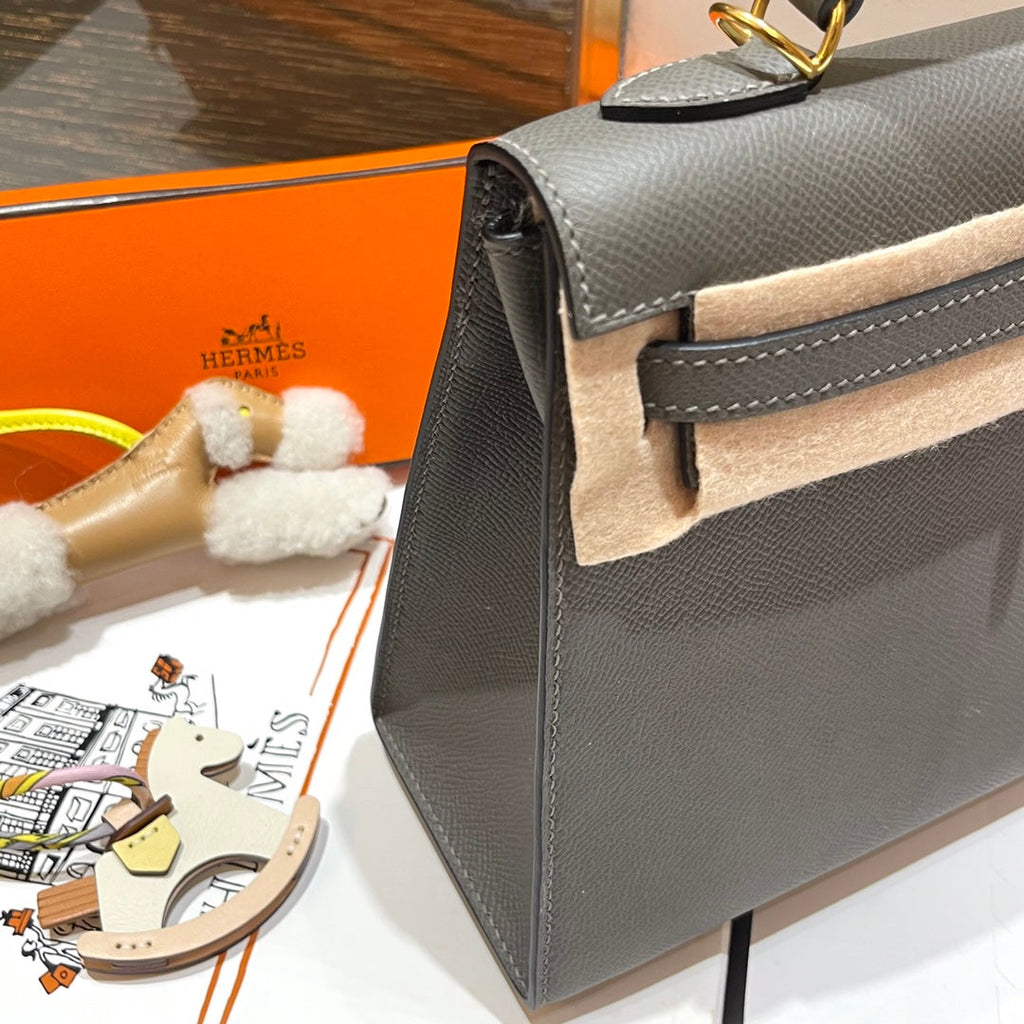 HM KELLY 25CM GRIS MOUETTE EPSOM LEDER GOLDENE BESCHLÄGE