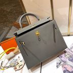 HM KELLY 25CM GRIS MOUETTE EPSOM LEDER GOLDENE BESCHLÄGE