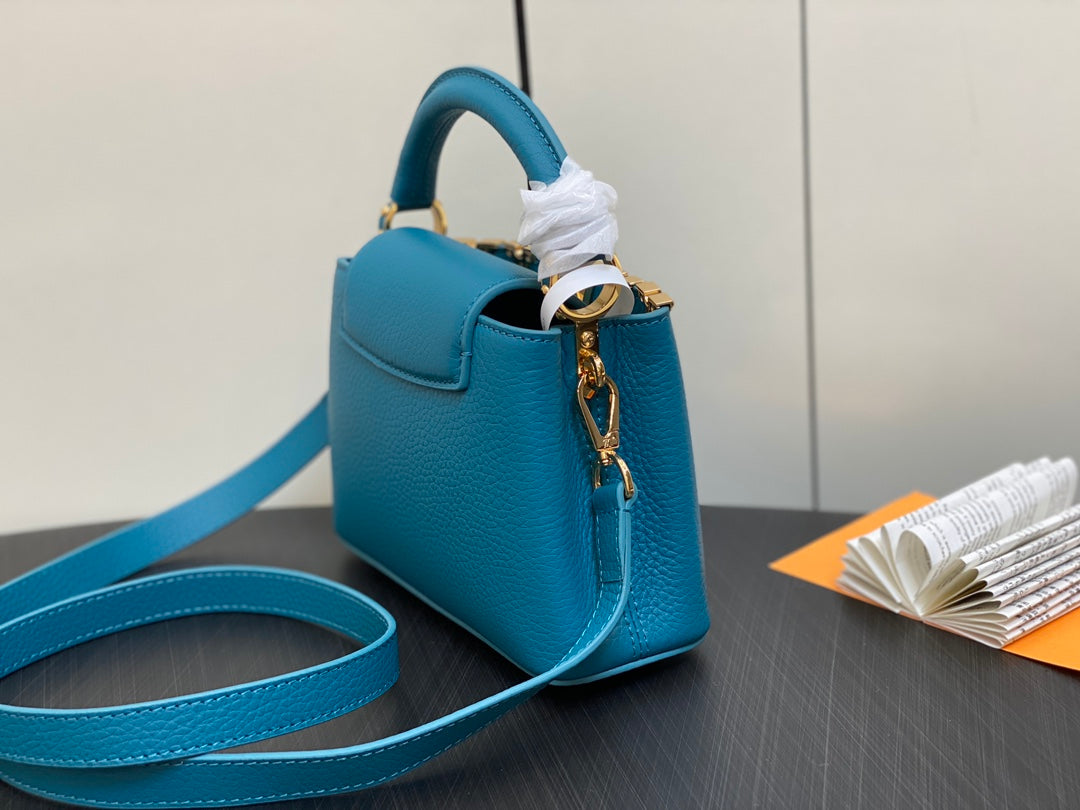 CAPUCINES MINI 21 BLAUES TAURILLON GOLD-HARDWARE