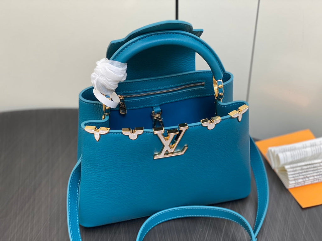 CAPUCINES BB 27 BLUE TAURILLON GOLD HARDWARE