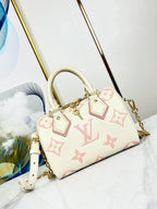 SPEEDY 20,5 WEISS-ROSA MONOGRAMM-LEINWAND 