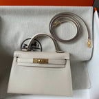 HM KELLY MINI 20 WEISS CHEVRE GOLDENE HARDWARE