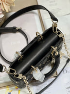 SMALL LADY D-JOY 22 BUTTERFLY STUD SCHWARZES LAMMFELL