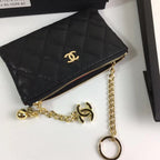 CC CLASSIC KLEINE REISSVERSCHLUSSTASCHE 15 SCHWARZES KALBSLEDER GOLD ICON