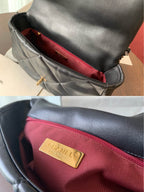 19 Klapptasche 30 Schwarzes Ziegenleder Goldene Beschläge 