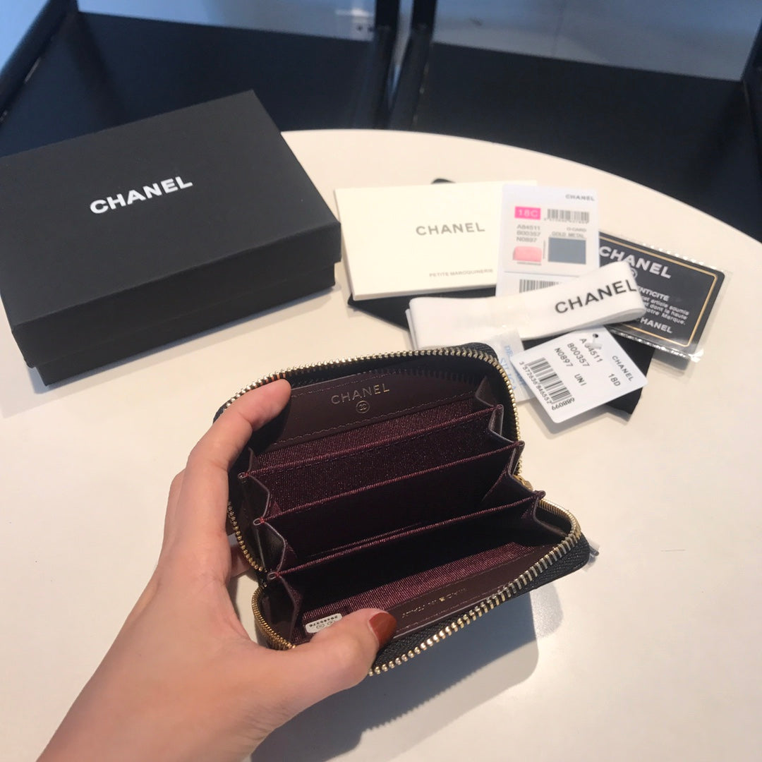 CC Reißverschluss-Kaviar-Geldbörse 11 Schwarzes Kalbsleder Gold Icon