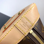 ALMA BB 23 IN BRAUNEM MONOGRAMM-CANVAS UND BEIGEM KALBSLEDERBESATZ MIT GOLDENER SCHNALLE