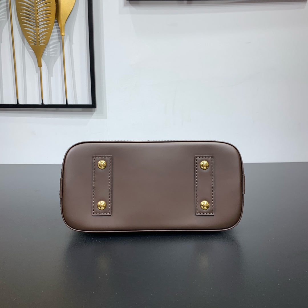 GEFLOCHTENE ALMA BB 23 IN BRAUNER DAMIER EBENE CANVAS-GOLDSCHNALLE