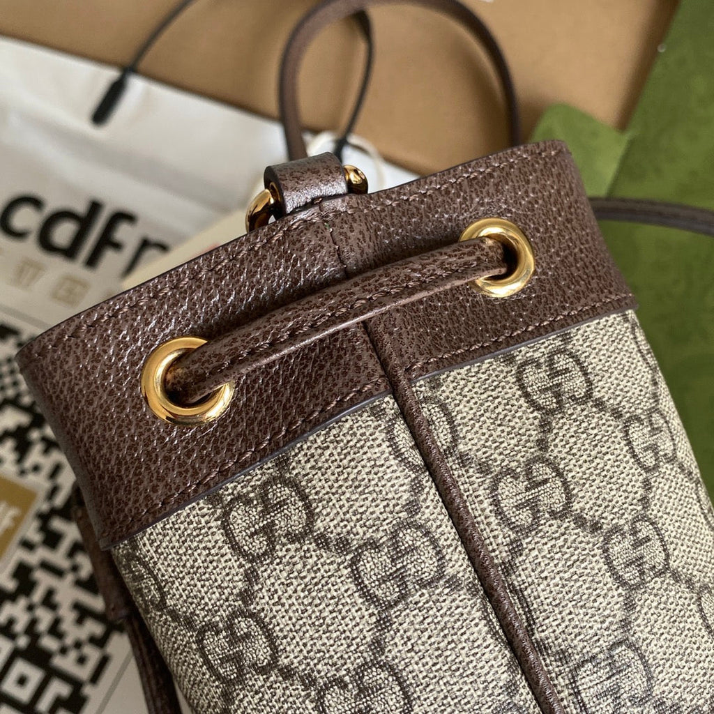 OPHIDIA MINI-BUCKET-BAG 18 MIT WEB IN BEIGE EBONY CANVAS MIX BRAUN CALFLEDER