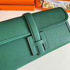 JIGE ELAN 29 CLUTCH IN FOREST GREEN CALFSKIN