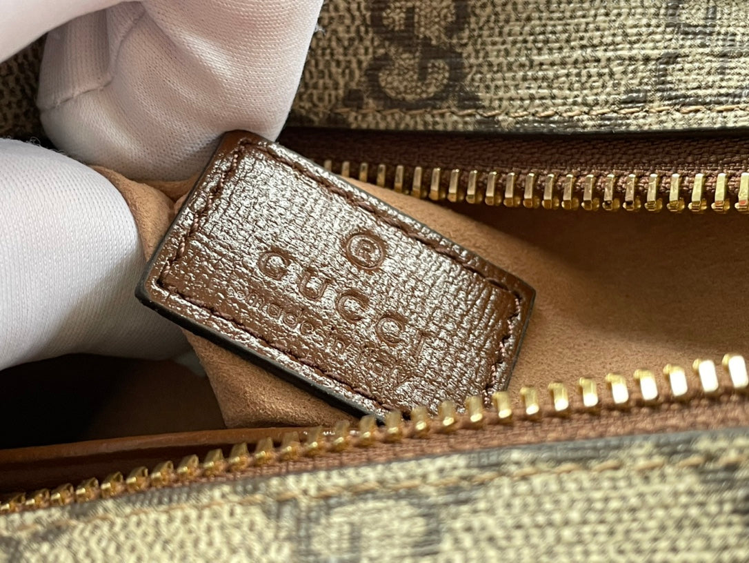 TASCHE MIT INEINANDERVERSCHLUSS G 22 AUS BEIGE-EBONY-CANVAS UND BRAUNEN KALBSLEDERBESETZUNG