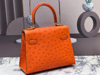 KELLY BAG 20 IN FIRE ORANGE OSTRICH LEATHER WITH GOLD HARDWARE (MADE-TO-ODER)