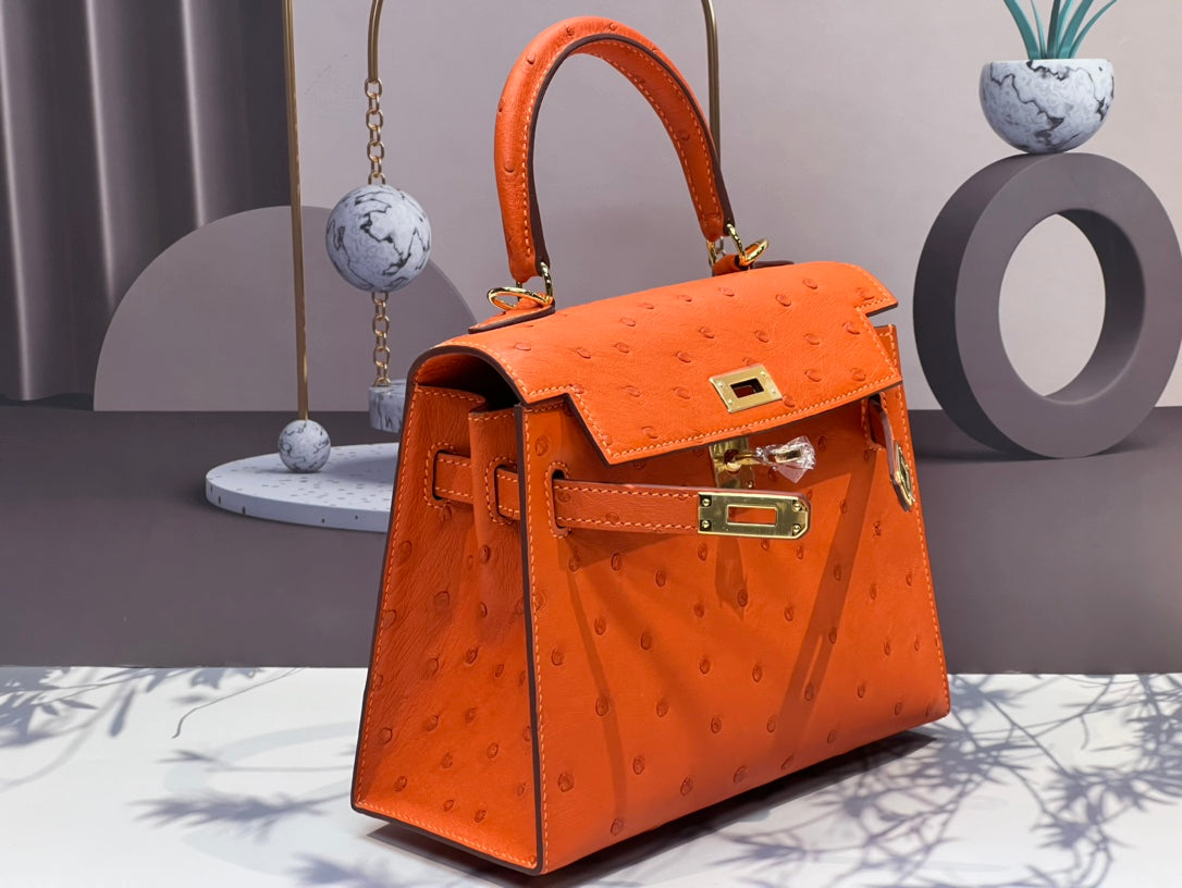 KELLY TASCHE 20 IN FEUERORANGE STREITLEDER MIT GOLDENEN BESCHLÄGEN (AUF BESTELLUNG GEFERTIGT)