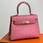 KELLY TASCHE 20 IN ROSA STREITLEDER MIT GOLDENEN BESCHLÄGEN (AUF BESTELLUNG GEFERTIGT)