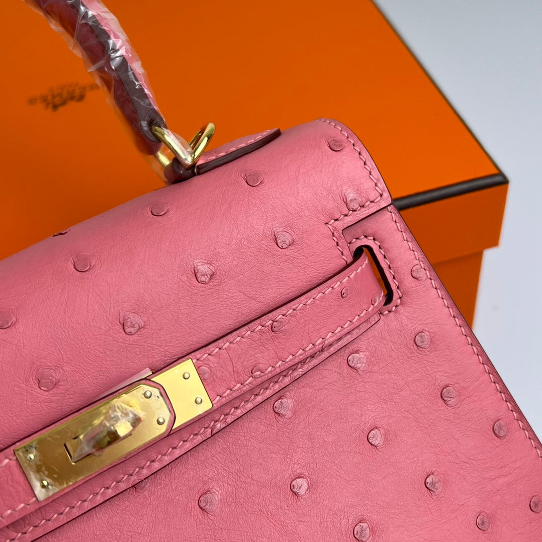KELLY TASCHE 20 IN ROSA STREITLEDER MIT GOLDENEN BESCHLÄGEN (AUF BESTELLUNG GEFERTIGT)