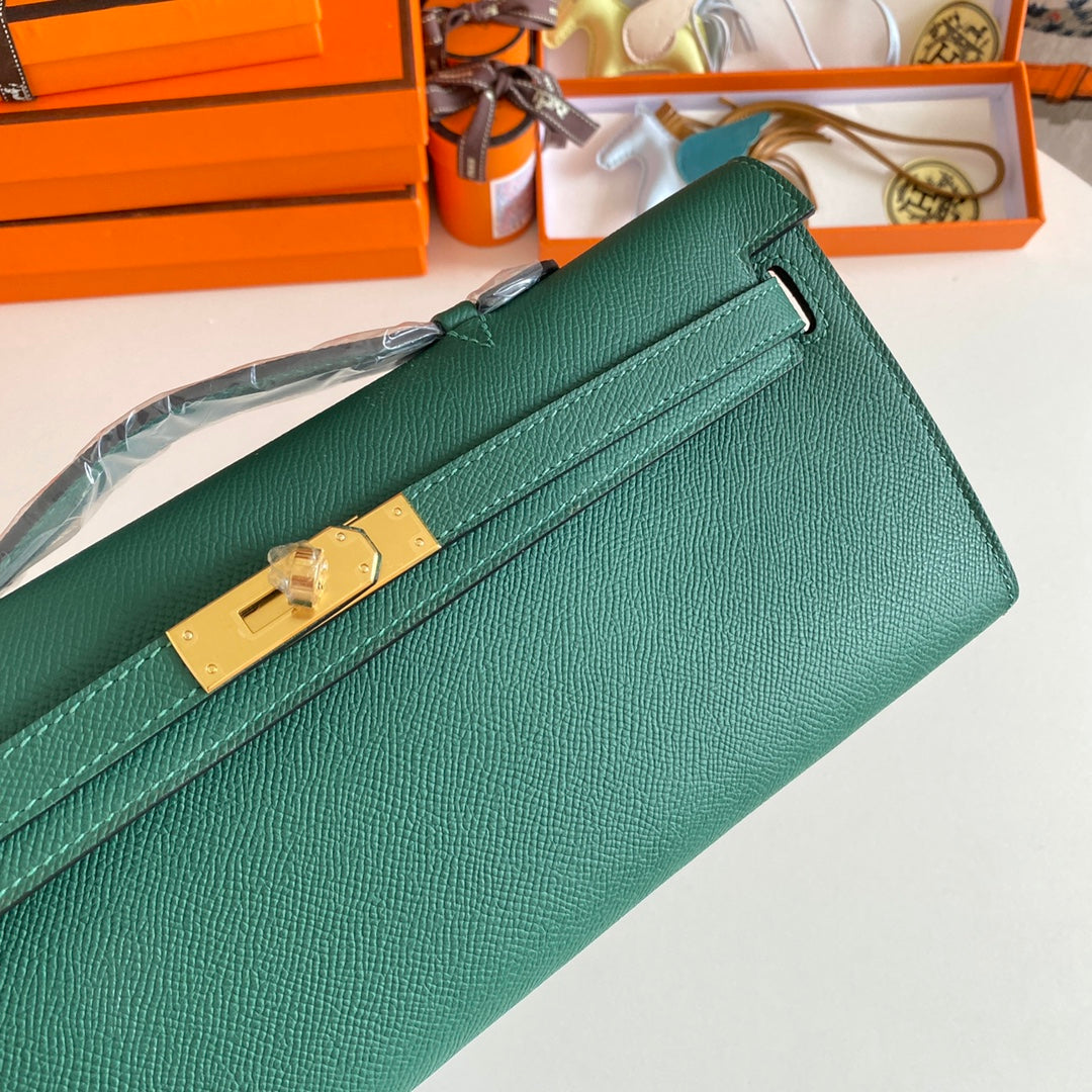 KELLY CUT 31 IN GREEN FOREST CALFLEDER MIT GOLDENEN HARDWARE