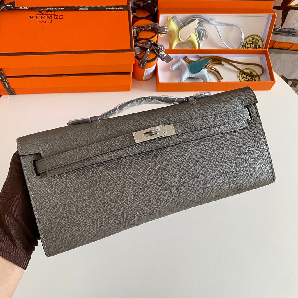 KELLY CUT 31 IN WOOD BROWN CALFLEDER WITH SILVER HARDWARE