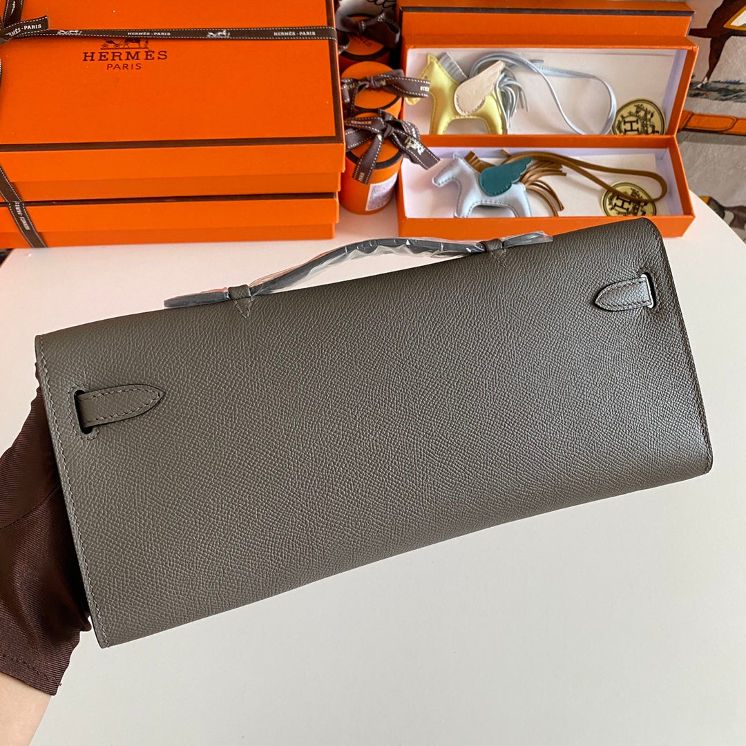 KELLY CUT 31 IN WOOD BROWN CALFLEDER WITH SILVER HARDWARE