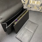 CARO SLIM POUCH 21 BAG IN BLACK CALFSKIN