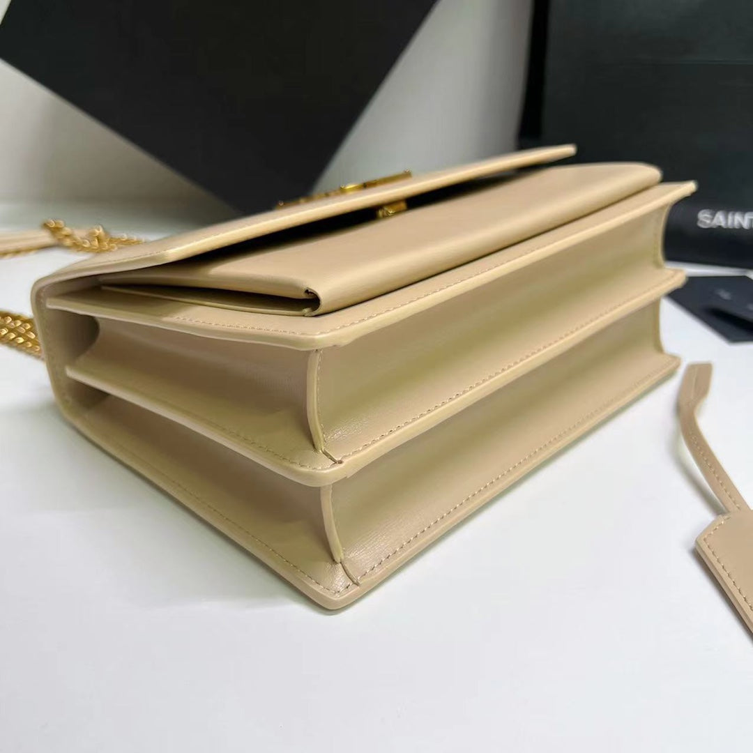 SUNSET MEDIUM 22 IN BEIGE CALFLEDER GOLDENE HARDWARE