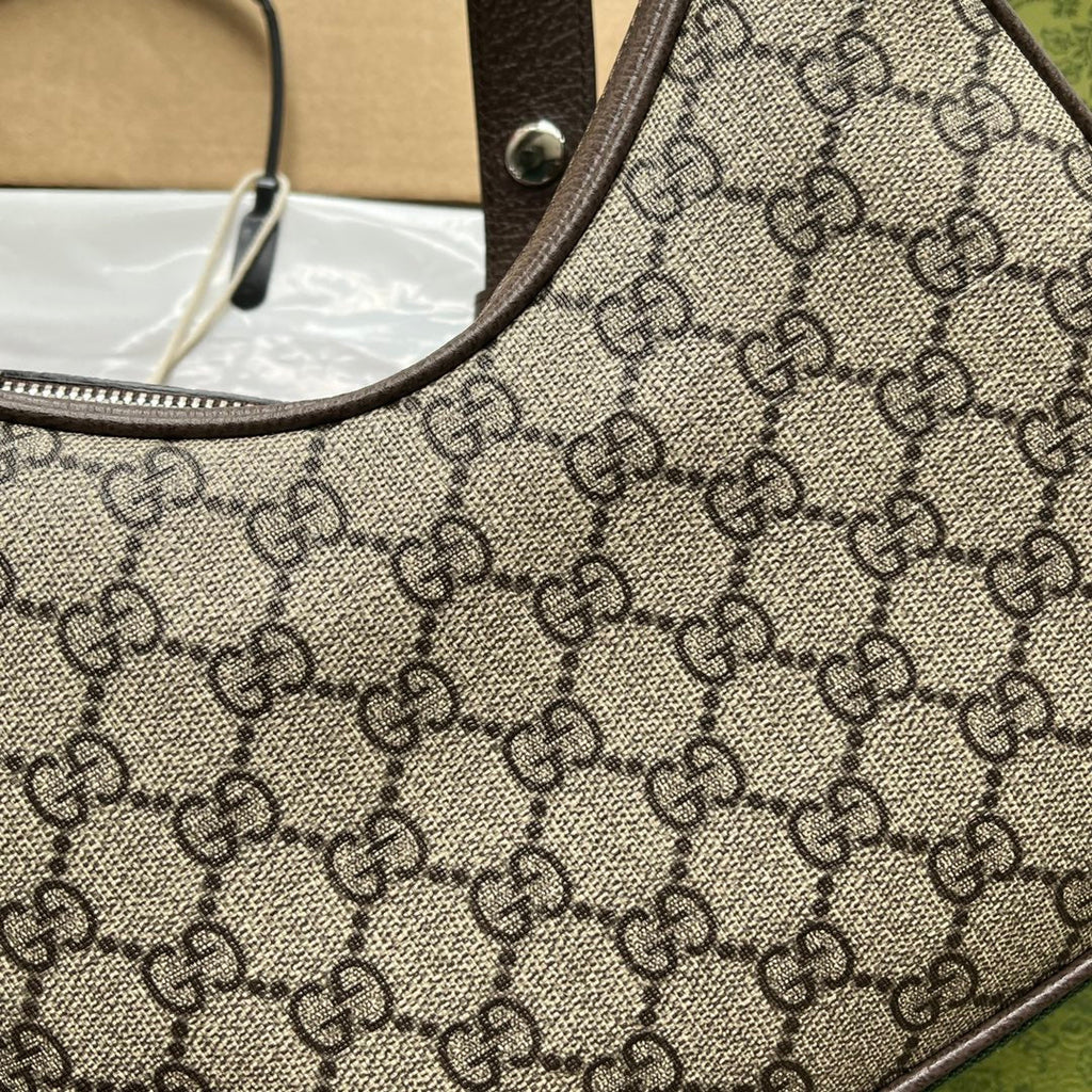 ATTACHE MINI BAG 23 IN BEIGE GG UND BRAUNEM BESATZ AUS KALBSLEDER