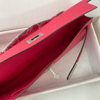 KELLY CUT 31 IN KIRSCHROTEM KALBSLEDER MIT SILBERNEN BESCHLÄGEN