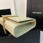 KATE TASSEL 24 KROKODILMUSTER KALBSLEDER WEISS MIT GOLDENEM LOGO