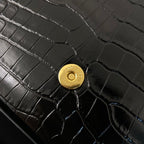 KATE TASSEL 24 KROKODILMUSTER KALBSLEDER SCHWARZ MIT GOLDENEM LOGO