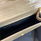 KATE TASSEL 24 KROKODILMUSTER KALBSLEDER BEIGE CREME MIT GOLDENEM LOGO