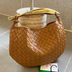 Sardine 33 mit Kette in hellbraunem Lammfell