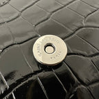 KATE TASSEL 20 SCHWARZES KROKODILMUSTER-KALBLEDER MIT SILBERNEN LOGO