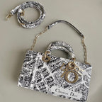 D-JOY 26-TASCHE MITTELGROSSE IN SCHWARZ-WEISSEM KALBSLEDER