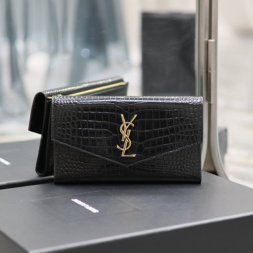 UPTOWN GELDBÖRSE 21 IN SCHWARZEM KROKODILMUSTER-KALBLEDER GOLDENES LOGO