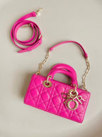 D-JOY TASCHE 22 IN ROSA LAMMLEDER