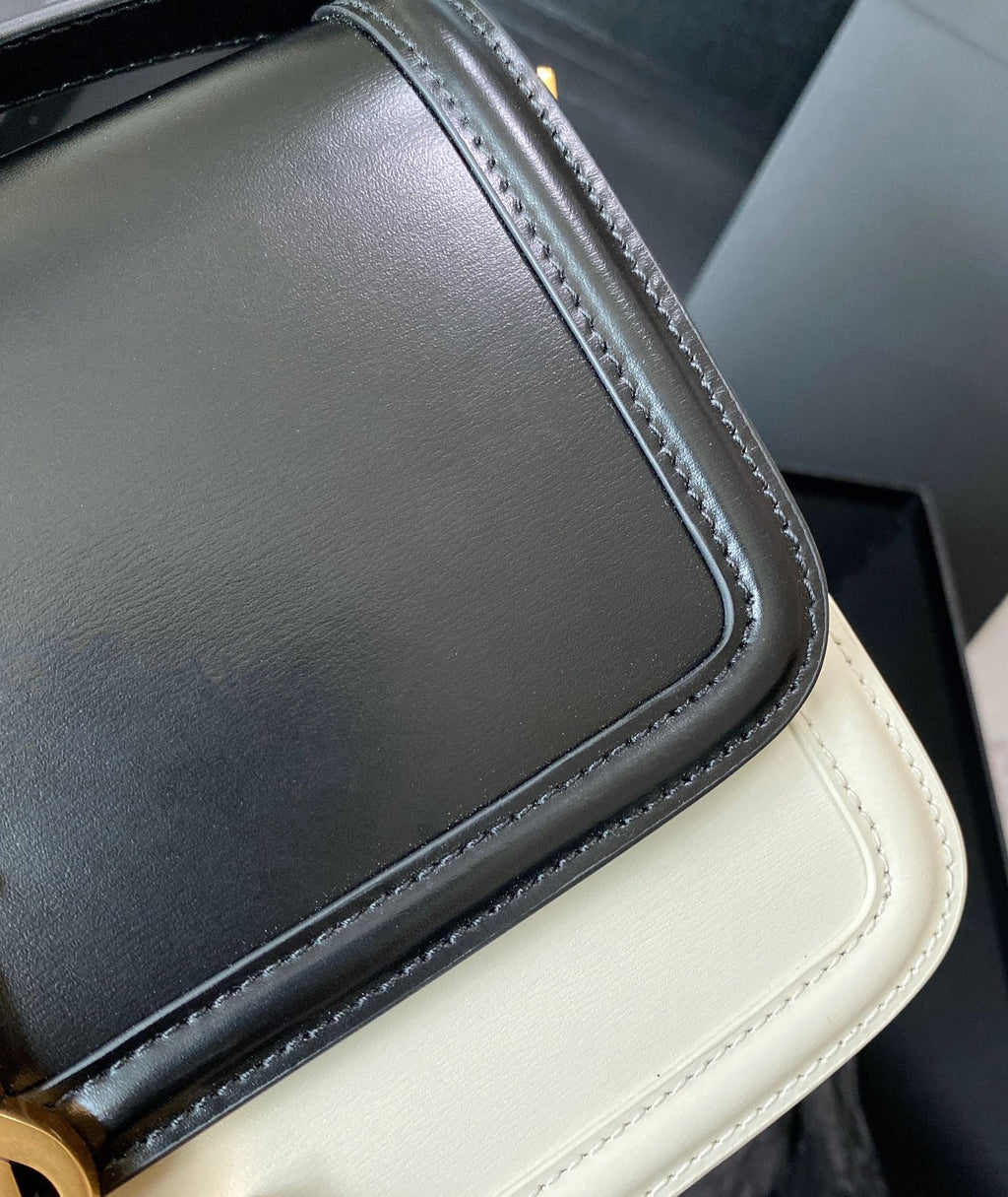 SOLFERINO MEDIUM SATCHEL 23 IN SCHWARZ-MIX WEISSES KALBSLEDER GOLDENES LOGO