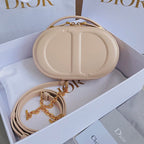 SIGNATURE 18 OVAL TASCHE IN BEIGEM KALBSLEDER