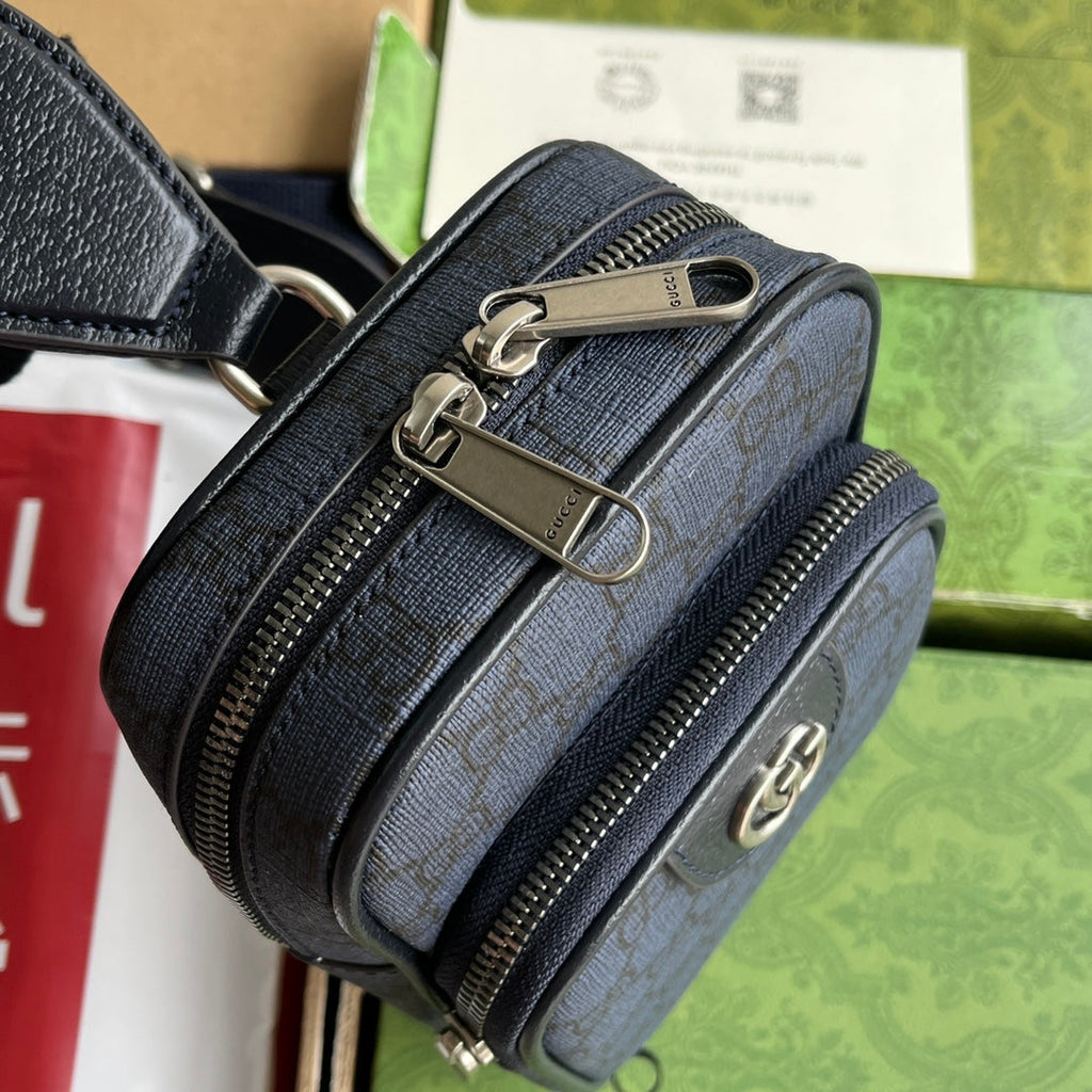 OPHIDIA MINI-TASCHE 18 IN DUNKELBLAUEM MONOGRAMM-CANVAS UND SCHWARZEM LAMMLEDERBESATZ
