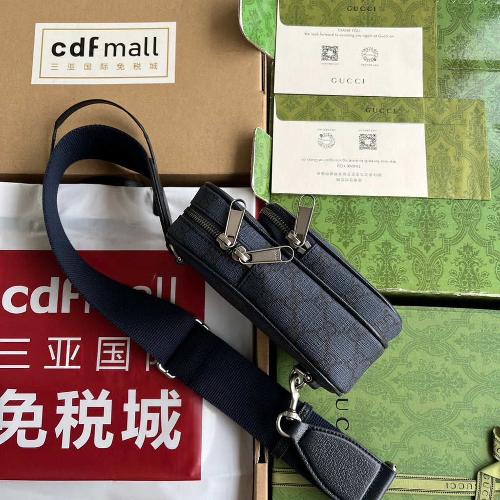 OPHIDIA MINI-TASCHE 18 IN DUNKELBLAUEM MONOGRAMM-CANVAS UND SCHWARZEM LAMMLEDERBESATZ