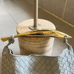 SARDINE 33 MIT KETTE IN GRAUEM LAMMHAUT