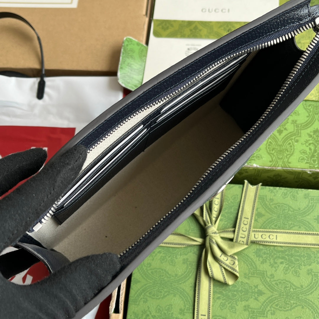 OPHIDIA POUCH 26 IN DUNKELBLAUEM MONOGRAMM-CANVAS UND SCHWARZEM LAMMLEDERBESETZUNG