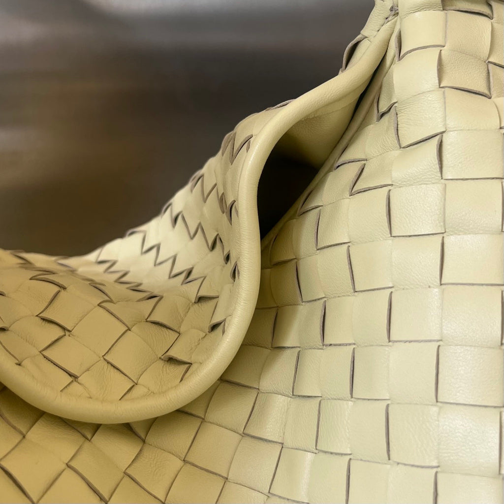 GROSSER HOP 54 IN DUNKELCREME LAMMHAUT