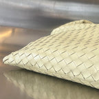 GROSSER HOP 54 IN DUNKELCREME LAMMHAUT