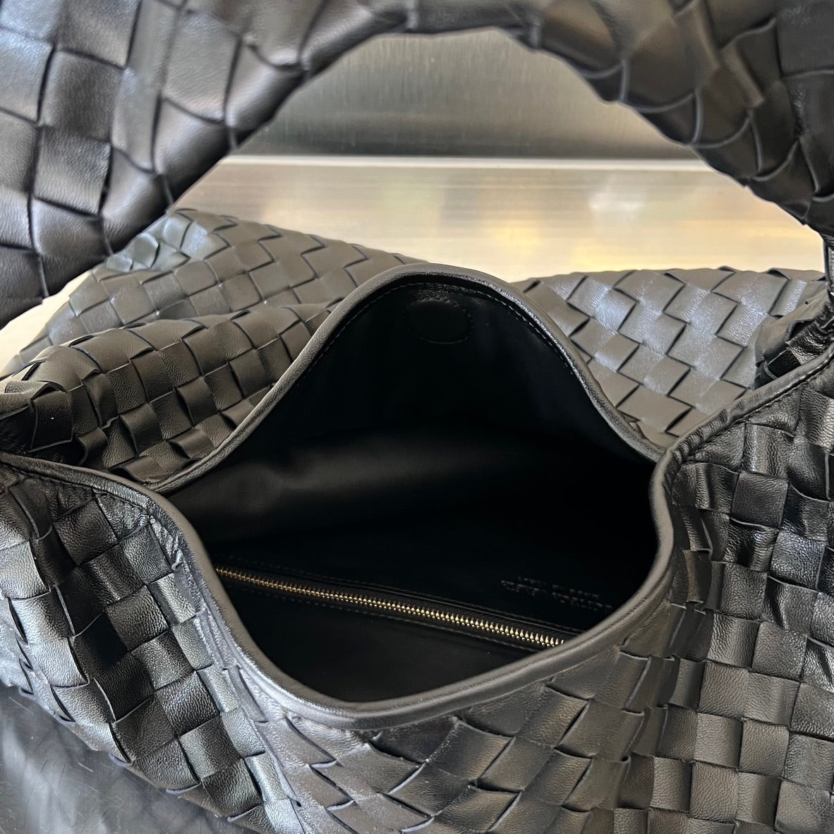 GROSSER HOP 54 IN SCHWARZES LAMMLEDER